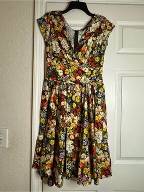 Retrolicious Floral Fit-and-Flare Mini Dress in Black with Multicolor Blooms